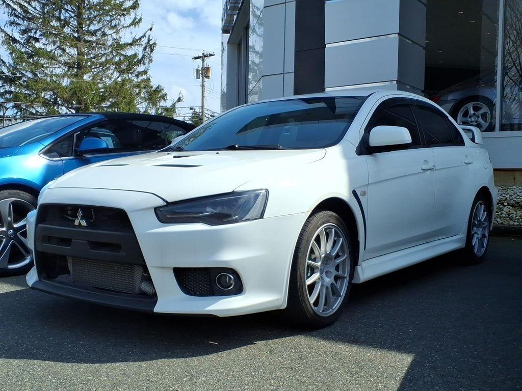 used 2013 Mitsubishi Lancer Evolution car, priced at $34,864