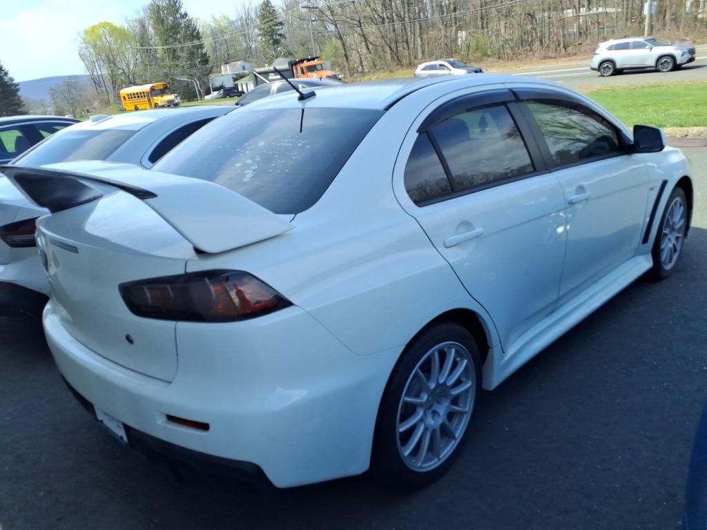 used 2013 Mitsubishi Lancer Evolution car, priced at $34,864