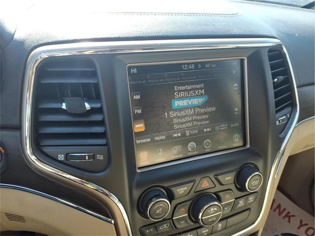 used 2014 Jeep Grand Cherokee car, priced at $10,000