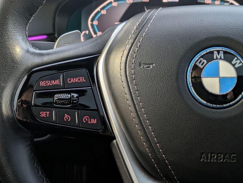 used 2023 BMW 530e car, priced at $27,136