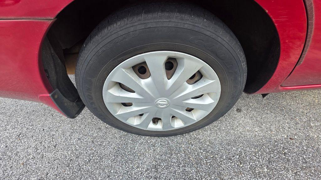 used 2014 Nissan Versa car, priced at $3,995