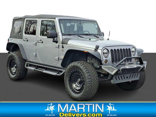 used 2014 Jeep Wrangler Unlimited car, priced at $17,637