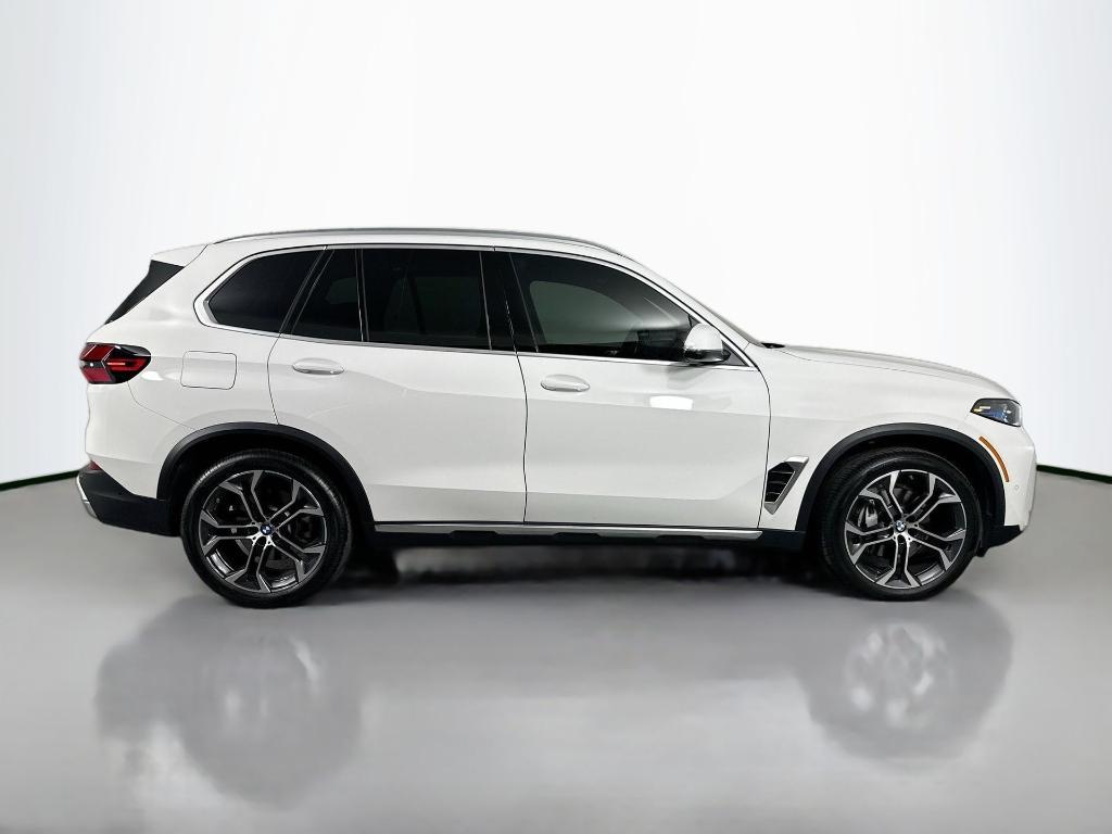 used 2025 BMW X5 car, priced at $59,904