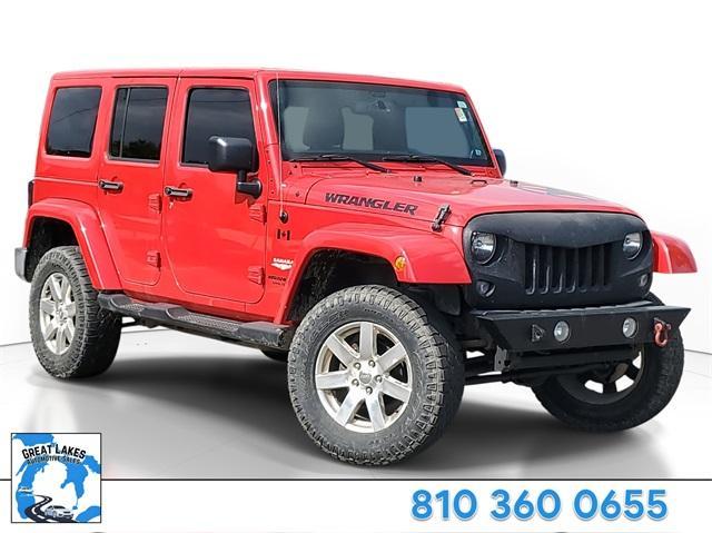 used 2014 Jeep Wrangler Unlimited car, priced at $11,898