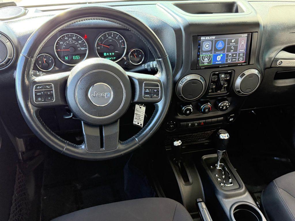 used 2015 Jeep Wrangler Unlimited car, priced at $16,979