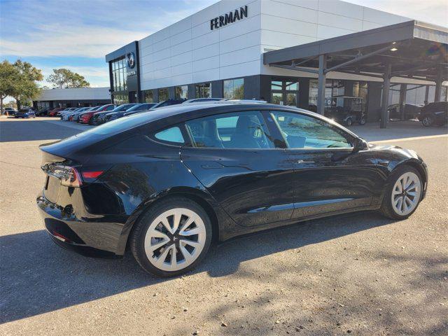 used 2023 Tesla Model 3 car, priced at $22,487