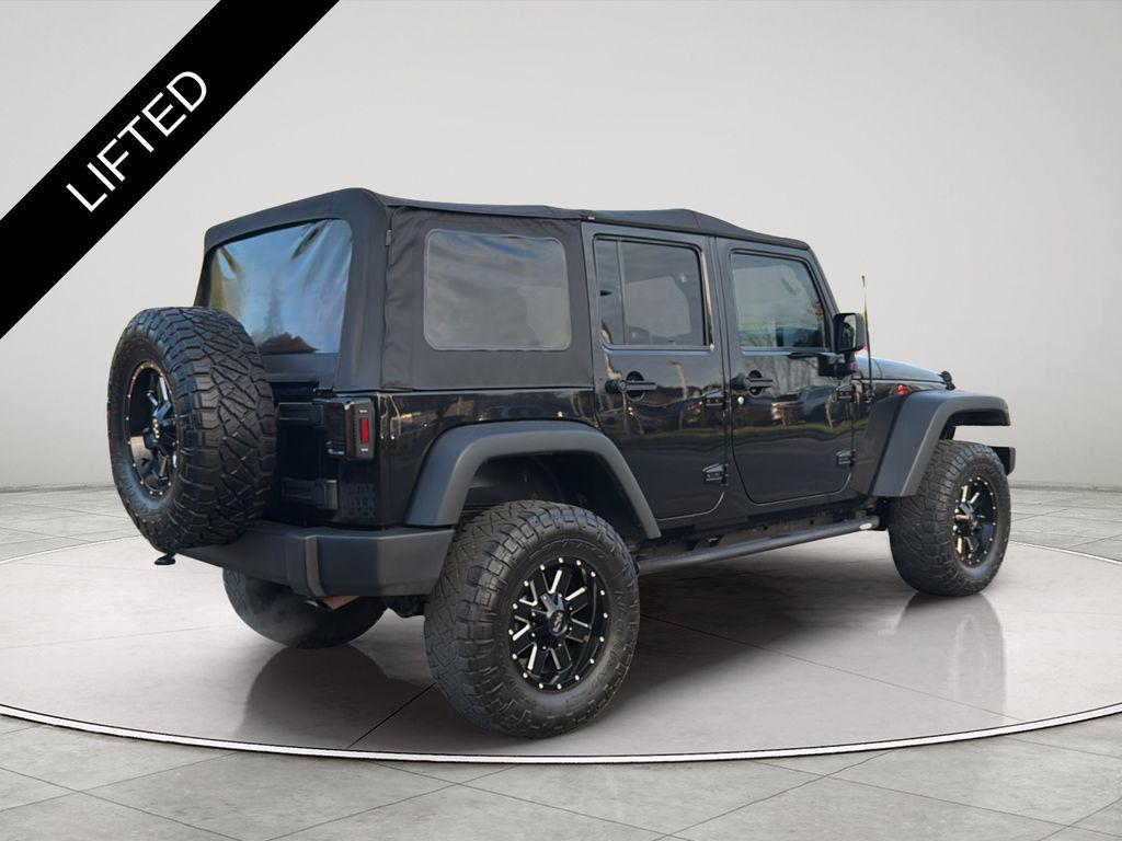 used 2018 Jeep Wrangler JK Unlimited car, priced at $18,386