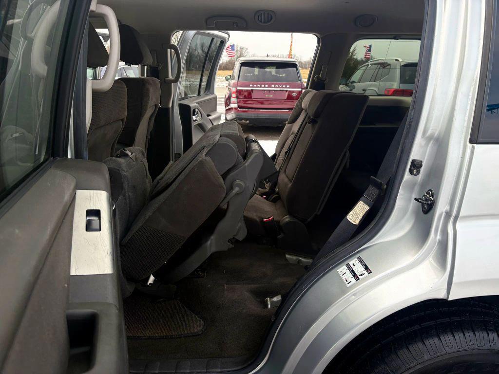 used 2005 Nissan Pathfinder car, priced at $7,500