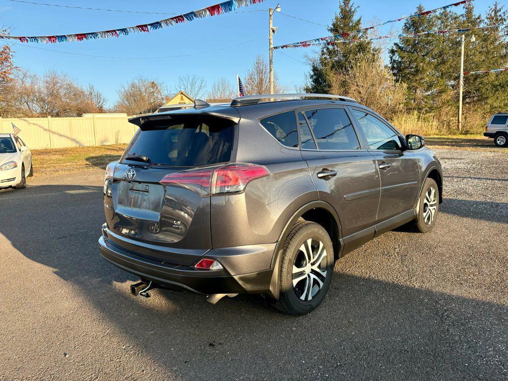 used 2018 Toyota RAV4 car, priced at $16,999