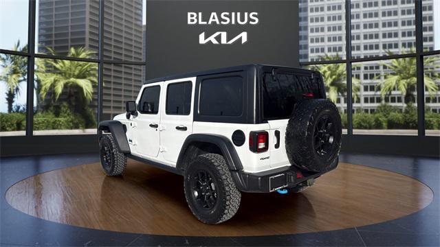 used 2024 Jeep Wrangler 4xe car, priced at $29,841