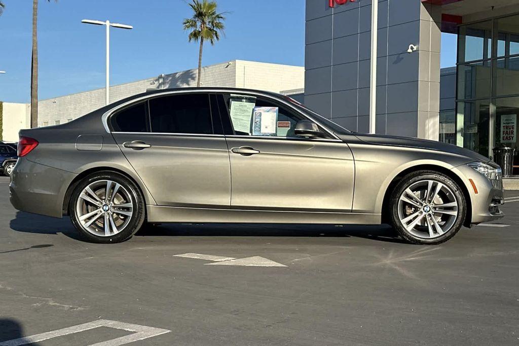 used 2018 BMW 330 car, priced at $15,688