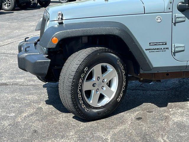 used 2014 Jeep Wrangler Unlimited car, priced at $16,169