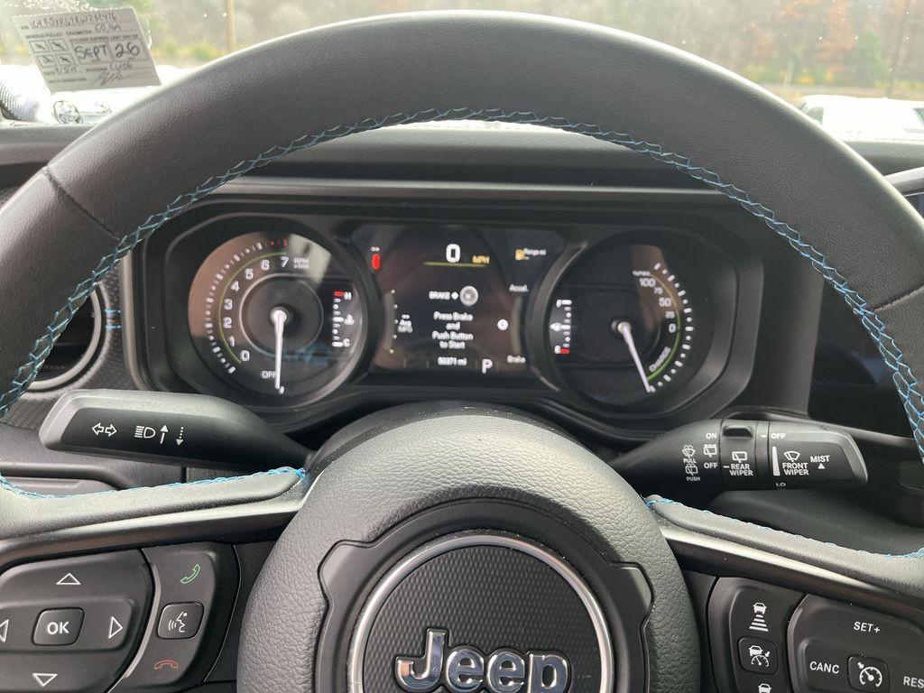 used 2024 Jeep Wrangler 4xe car, priced at $29,464