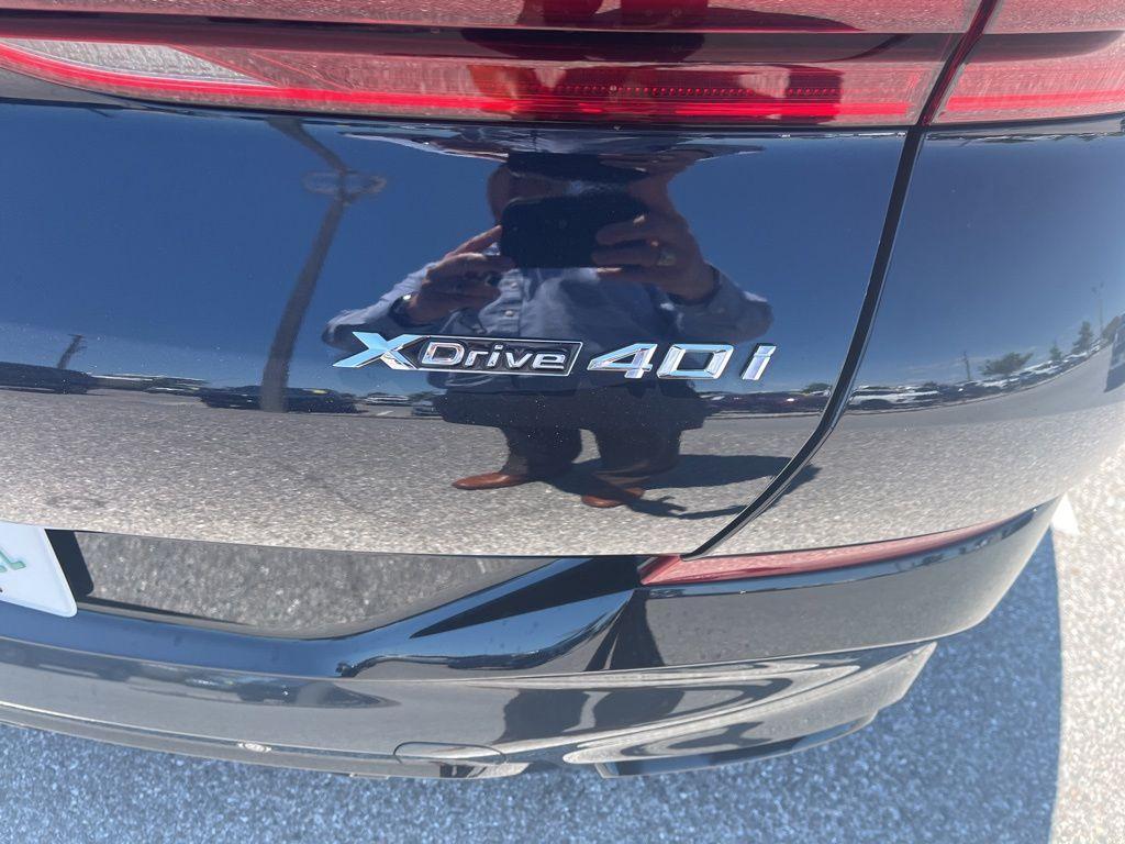 used 2024 BMW X6 car, priced at $65,896