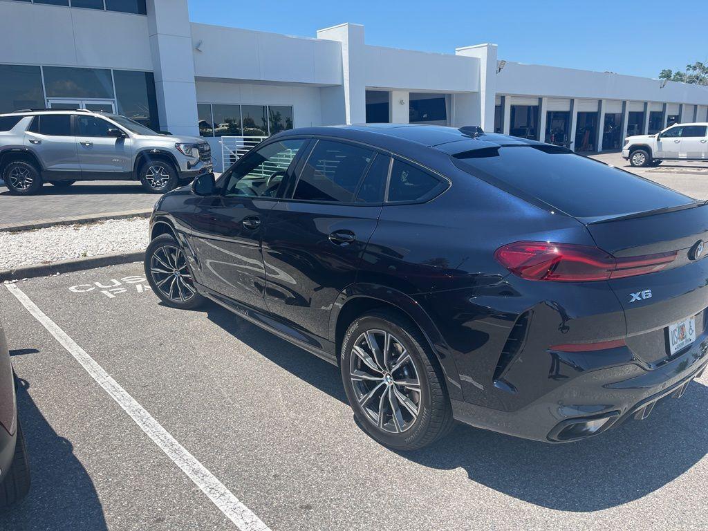 used 2024 BMW X6 car, priced at $65,896