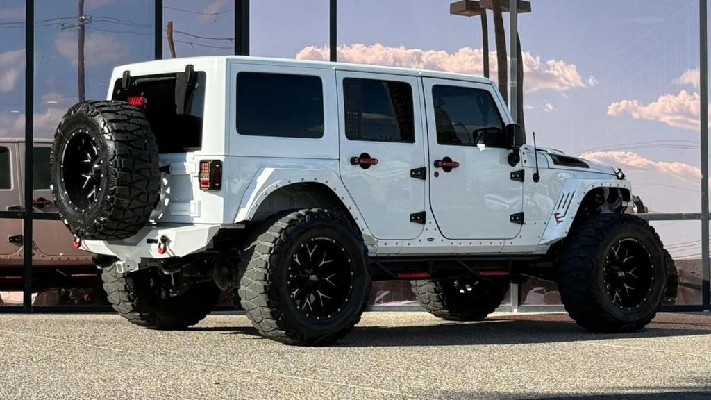 used 2018 Jeep Wrangler JK Unlimited car, priced at $25,990