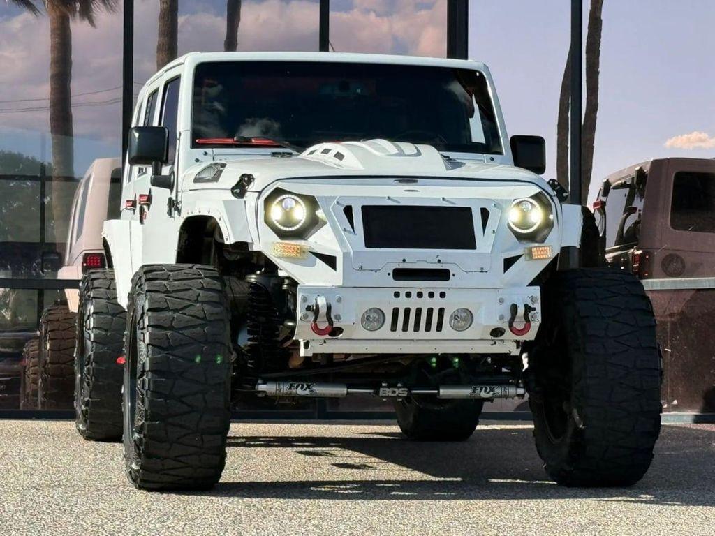 used 2018 Jeep Wrangler JK Unlimited car, priced at $25,990