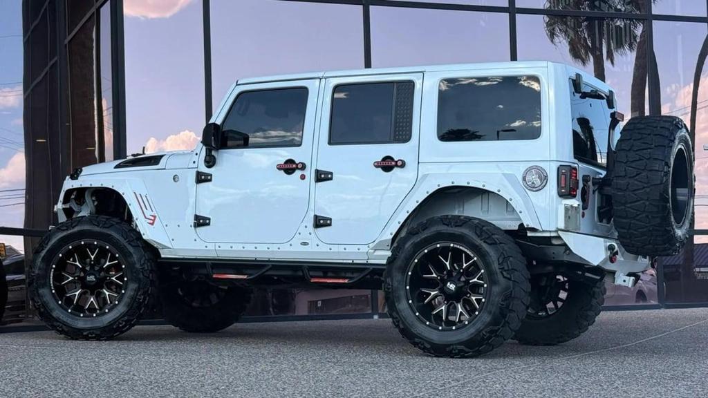 used 2018 Jeep Wrangler JK Unlimited car, priced at $25,990