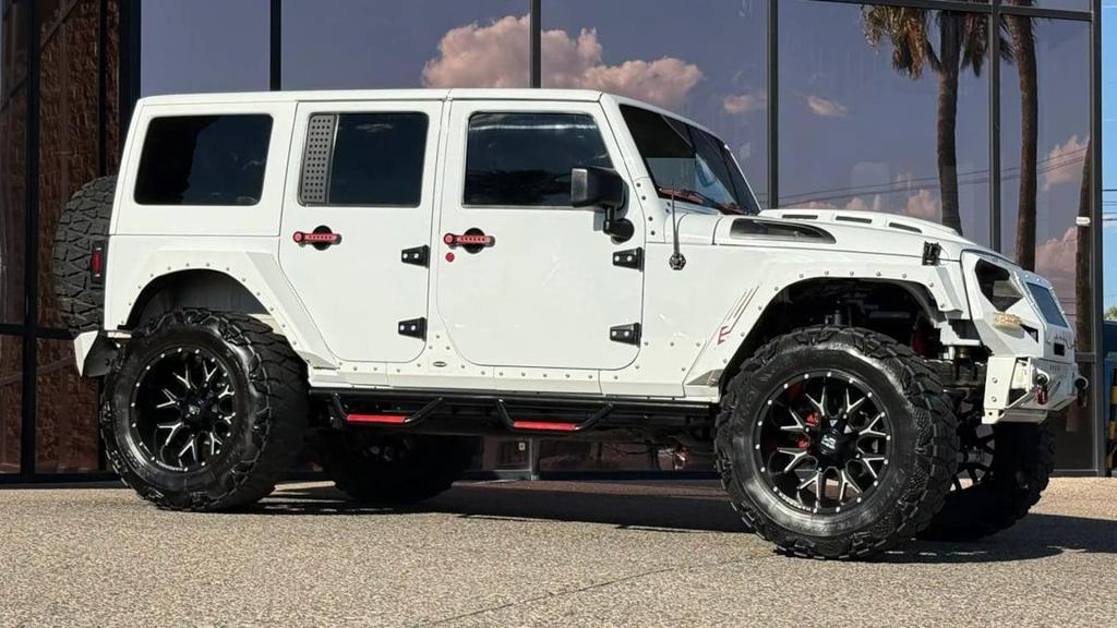 used 2018 Jeep Wrangler JK Unlimited car, priced at $25,990