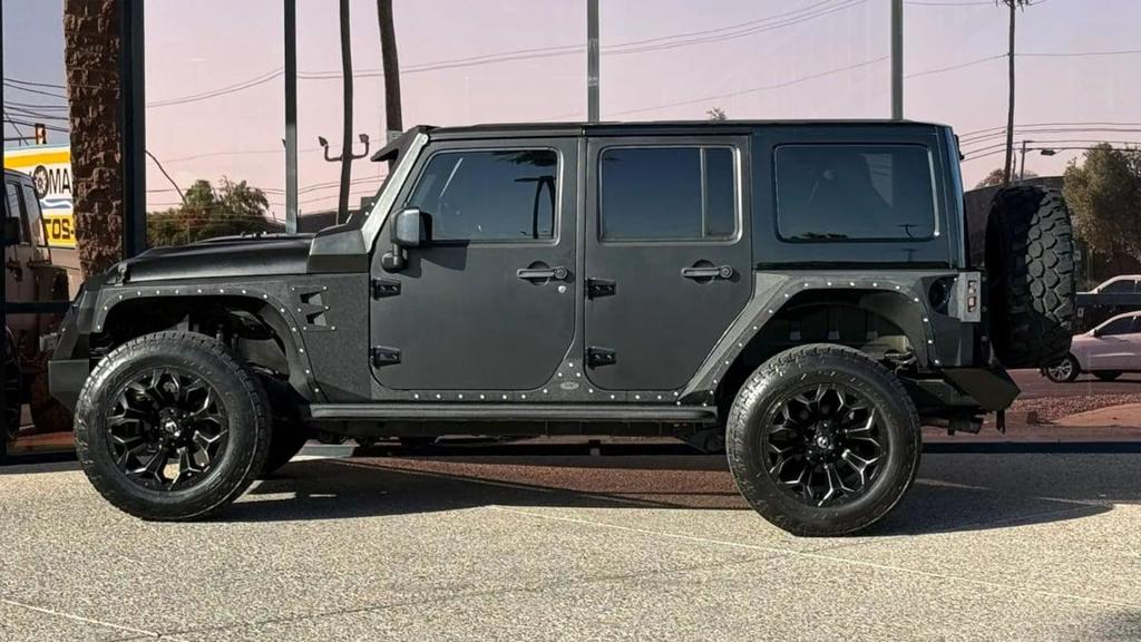 used 2013 Jeep Wrangler Unlimited car, priced at $27,990