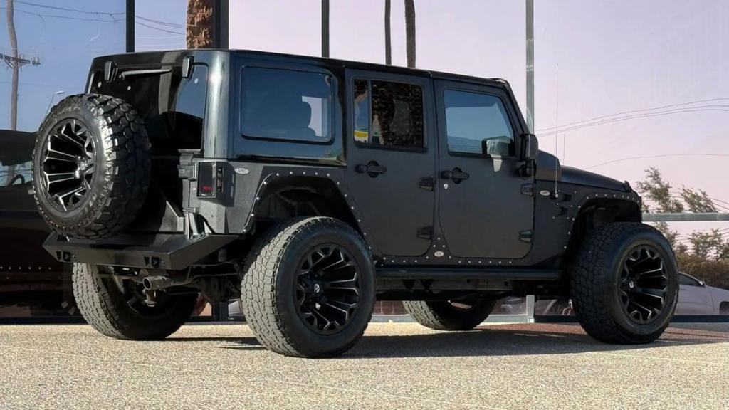 used 2013 Jeep Wrangler Unlimited car, priced at $27,990