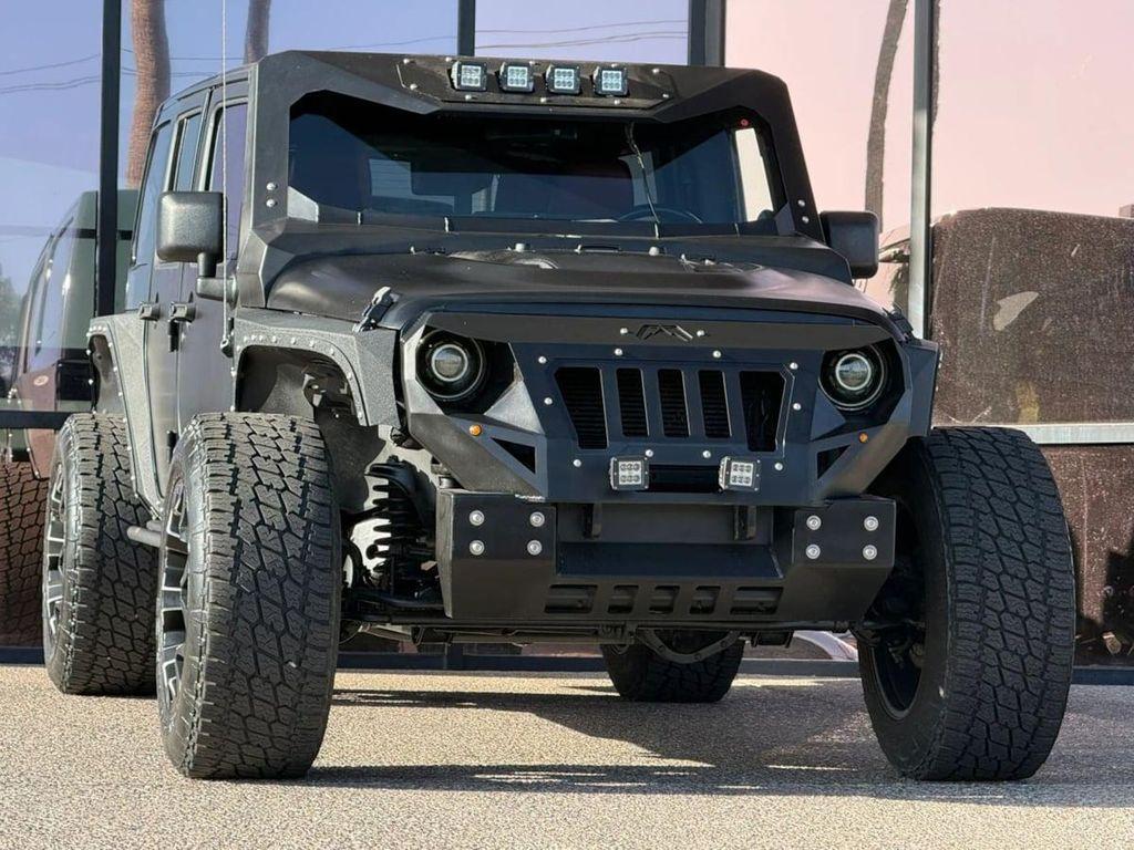 used 2013 Jeep Wrangler Unlimited car, priced at $27,990