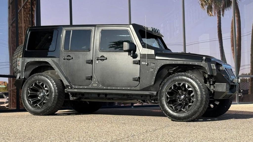 used 2013 Jeep Wrangler Unlimited car, priced at $27,990