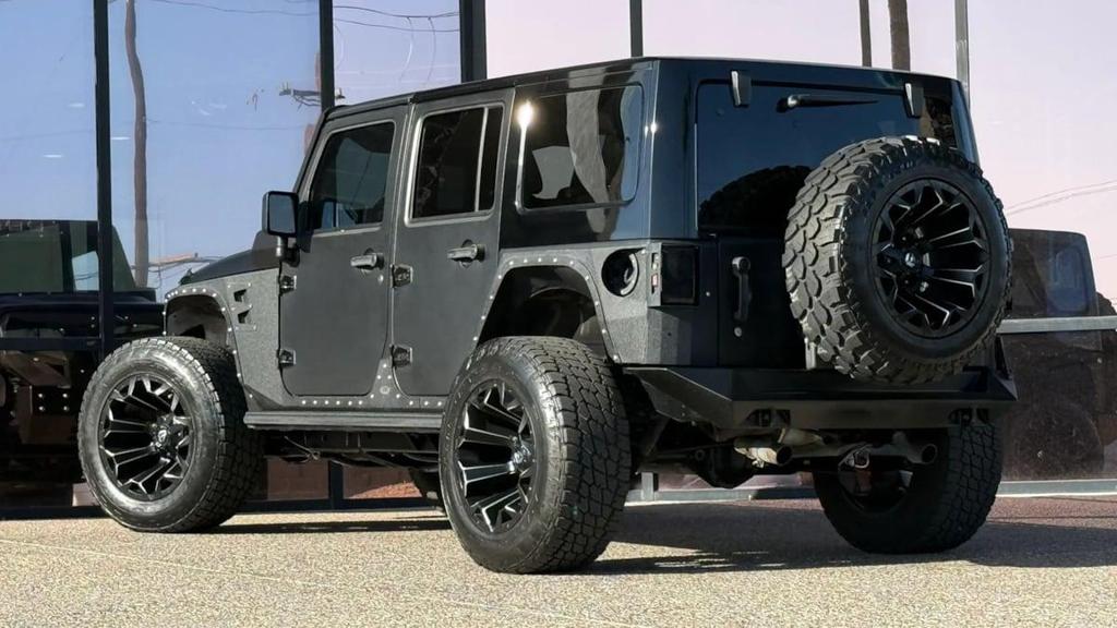 used 2013 Jeep Wrangler Unlimited car, priced at $27,990