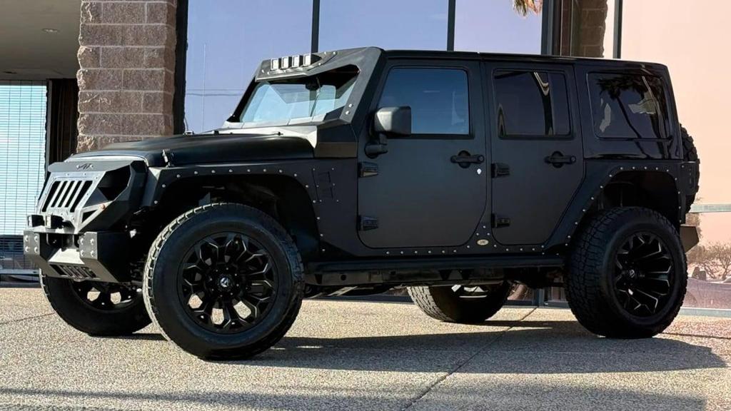used 2013 Jeep Wrangler Unlimited car, priced at $27,990