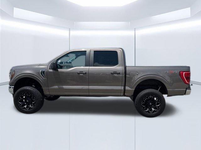 used 2023 Ford F-150 car, priced at $42,799
