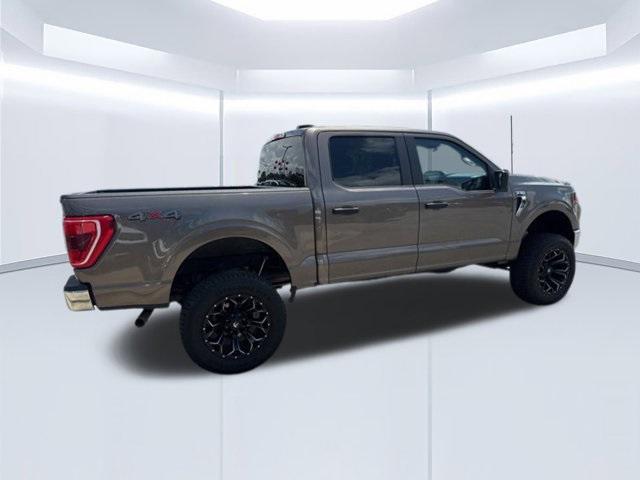 used 2023 Ford F-150 car, priced at $42,799