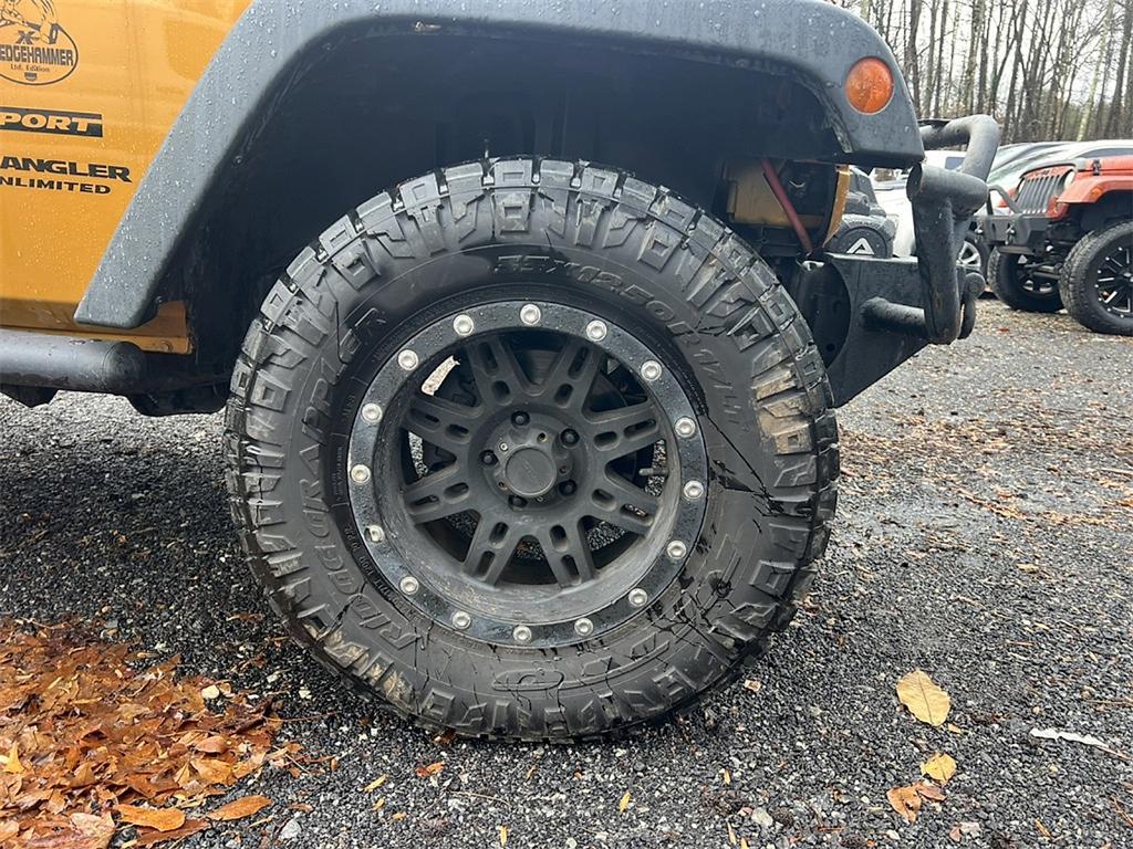 used 2014 Jeep Wrangler Unlimited car, priced at $11,998