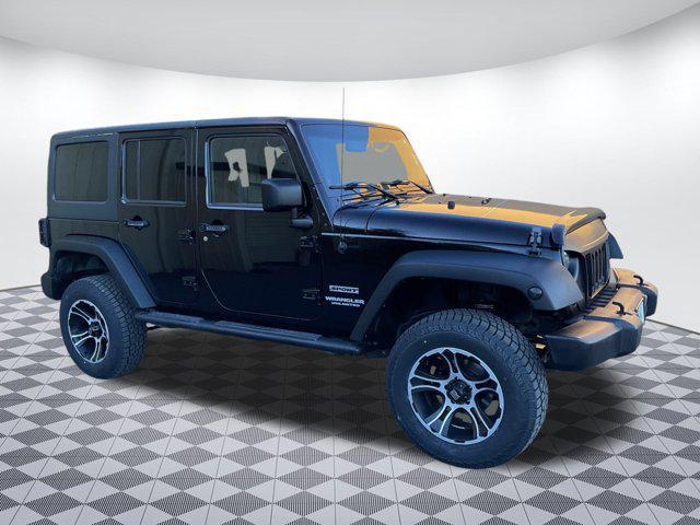 used 2013 Jeep Wrangler Unlimited car, priced at $12,999