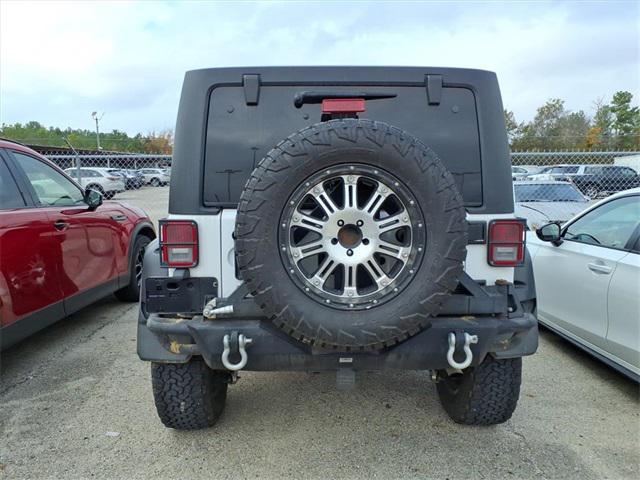 used 2012 Jeep Wrangler Unlimited car, priced at $17,995