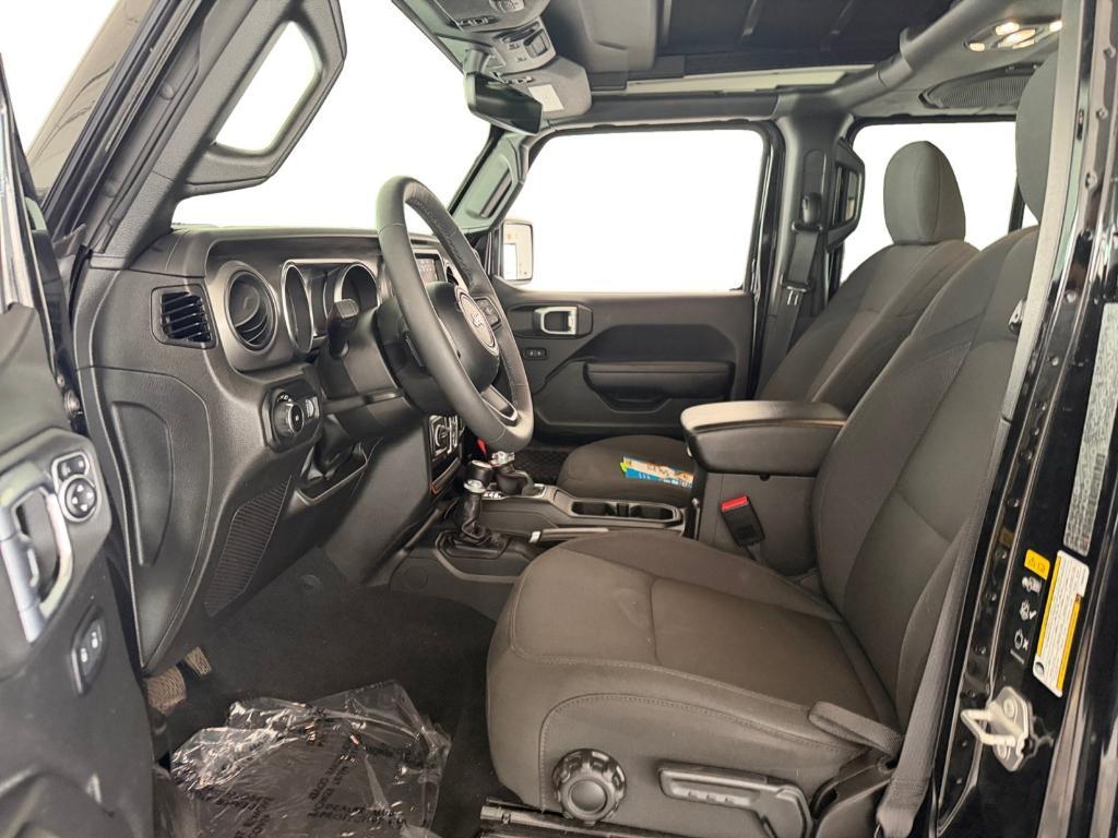 used 2023 Jeep Wrangler car, priced at $29,090