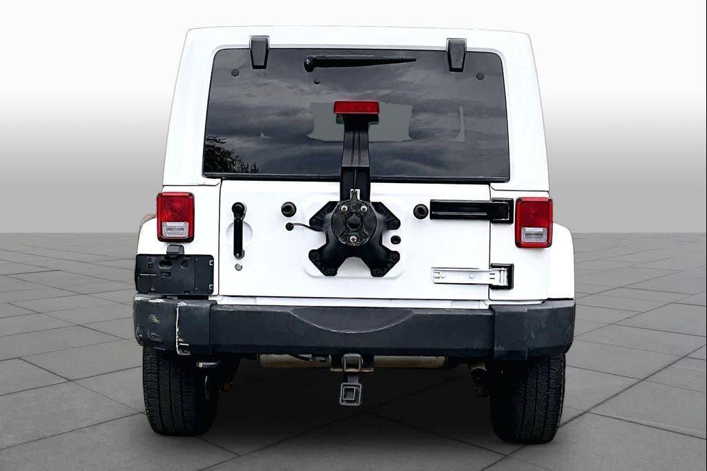 used 2016 Jeep Wrangler Unlimited car, priced at $17,672