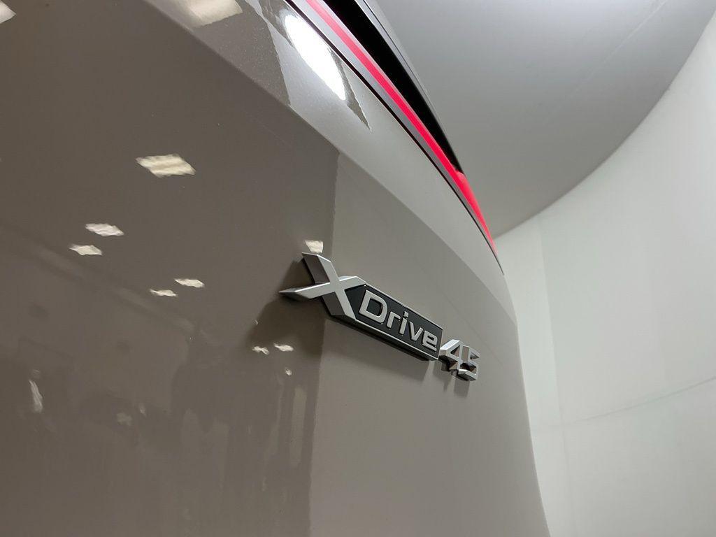 new 2026 BMW iX car, priced at $86,245