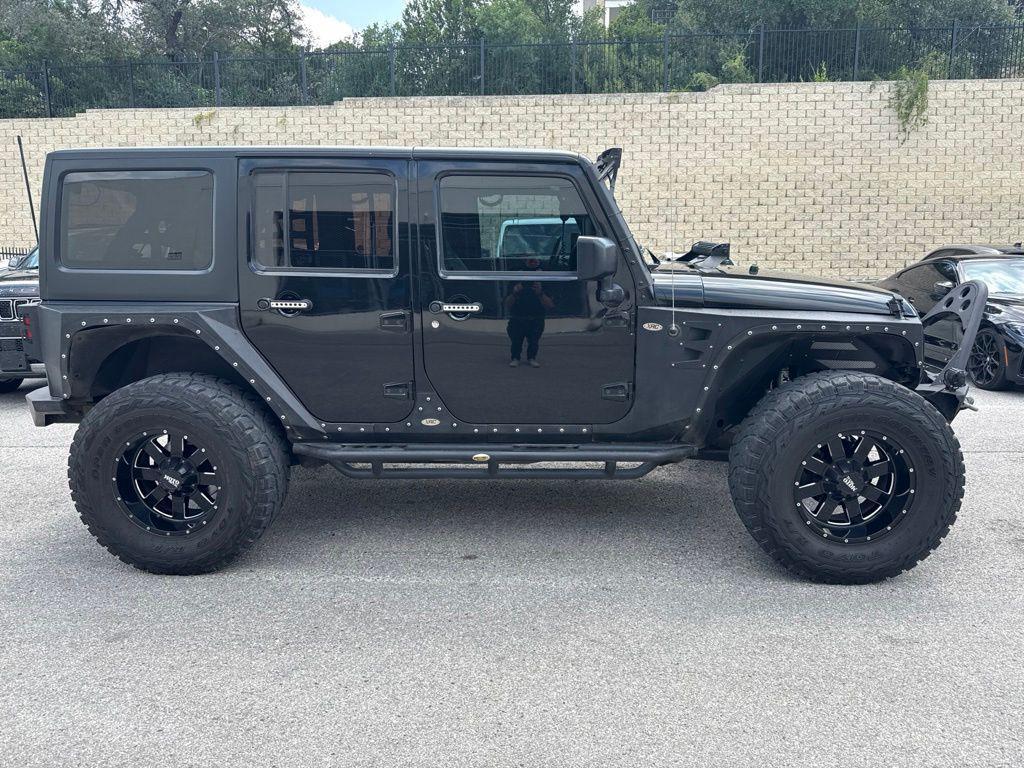 used 2015 Jeep Wrangler Unlimited car, priced at $19,462