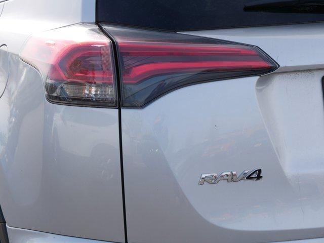used 2016 Toyota RAV4 Hybrid car, priced at $23,338