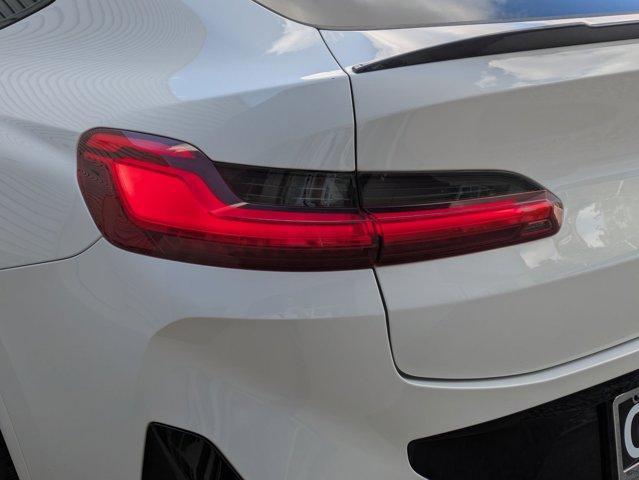 used 2023 BMW X4 M car, priced at $64,564
