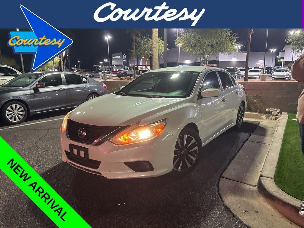 used 2018 Nissan Altima car, priced at $14,000