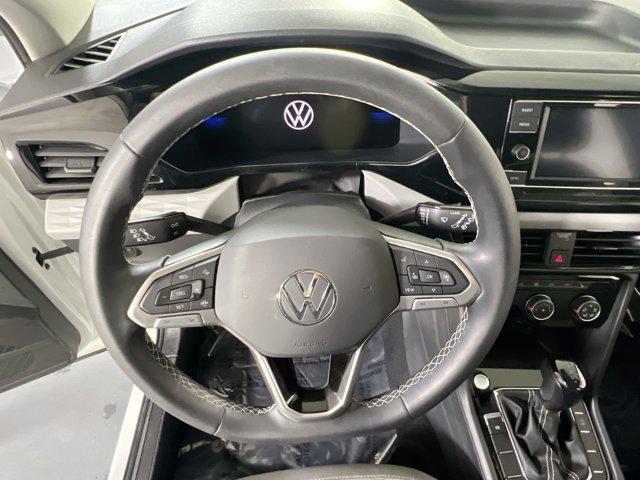 used 2023 Volkswagen Taos car, priced at $21,368
