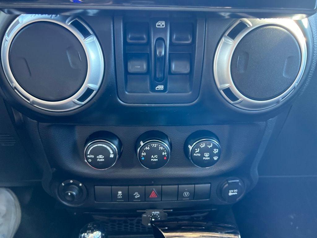 used 2015 Jeep Wrangler Unlimited car, priced at $25,992