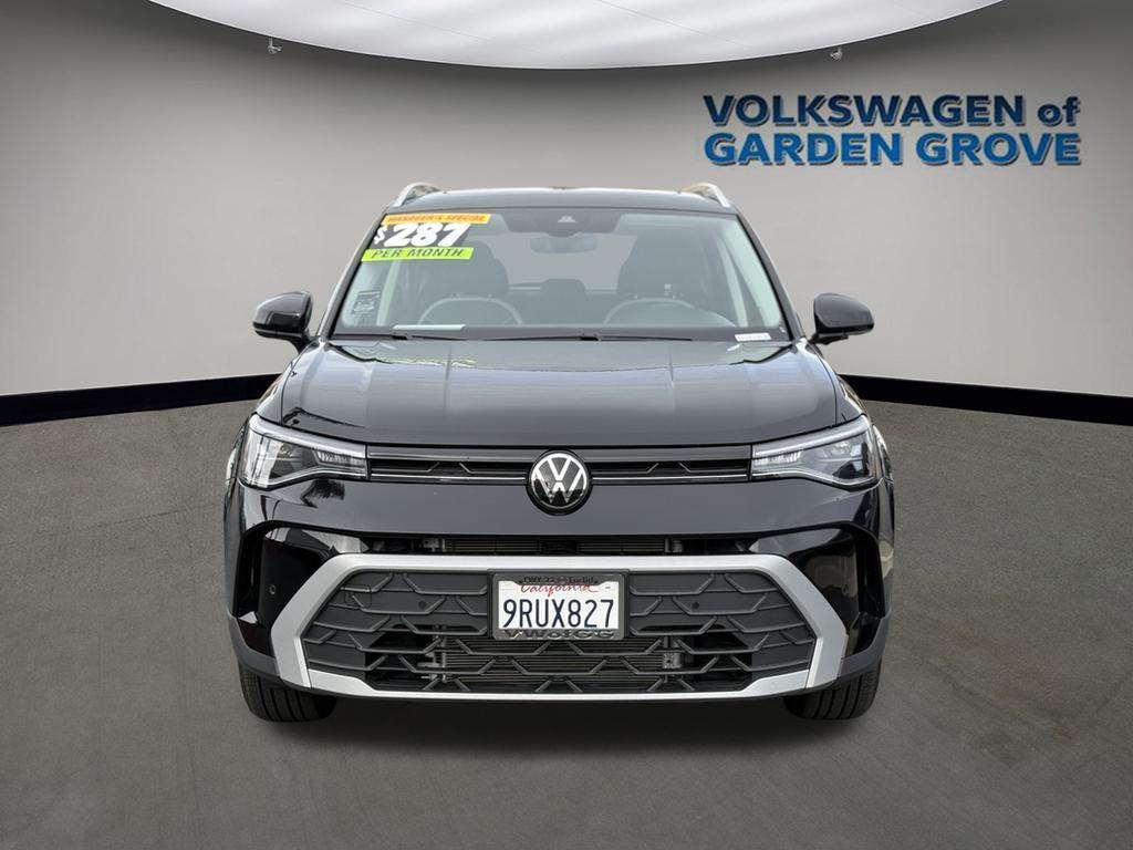 used 2025 Volkswagen Taos car, priced at $25,595