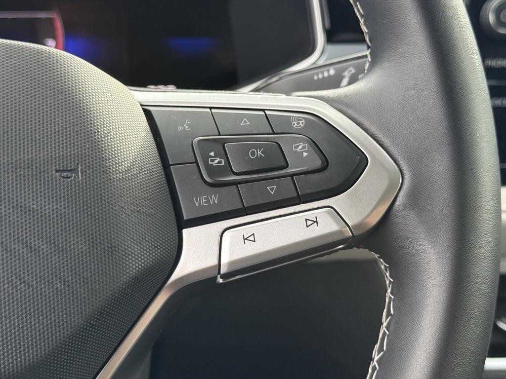 used 2025 Volkswagen Taos car, priced at $25,595