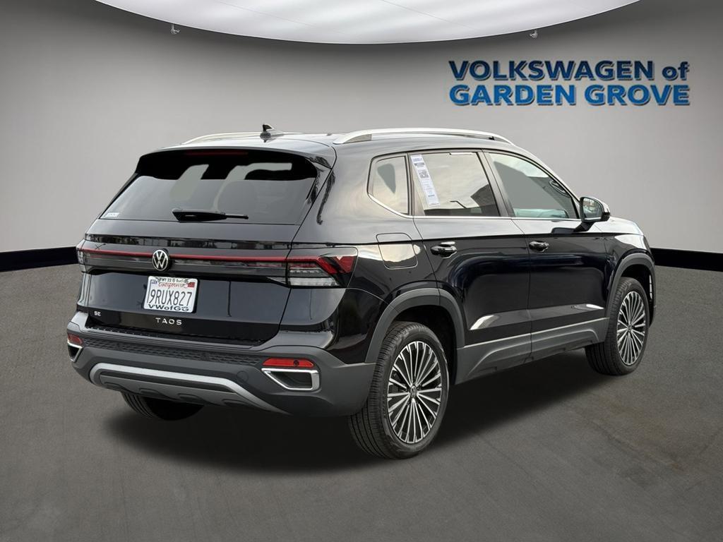 used 2025 Volkswagen Taos car, priced at $25,595