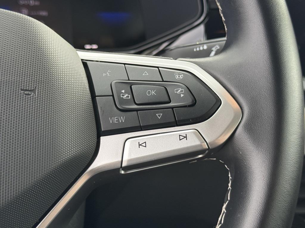 used 2025 Volkswagen Taos car, priced at $22,438
