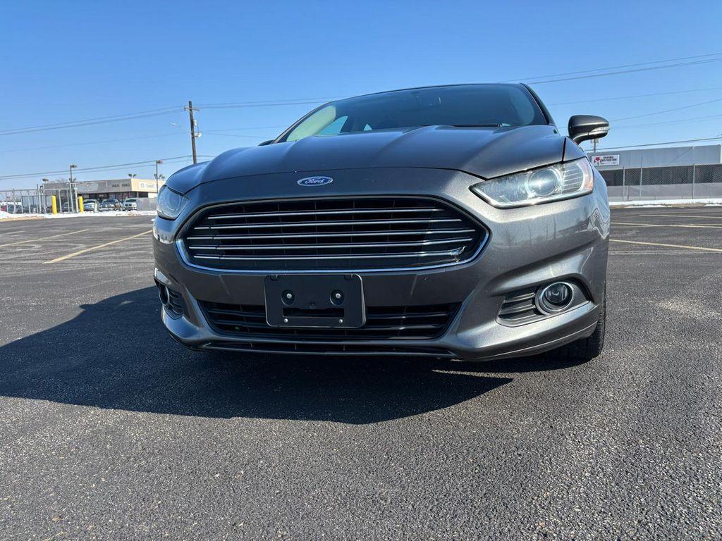 used 2016 Ford Fusion car, priced at $8,999