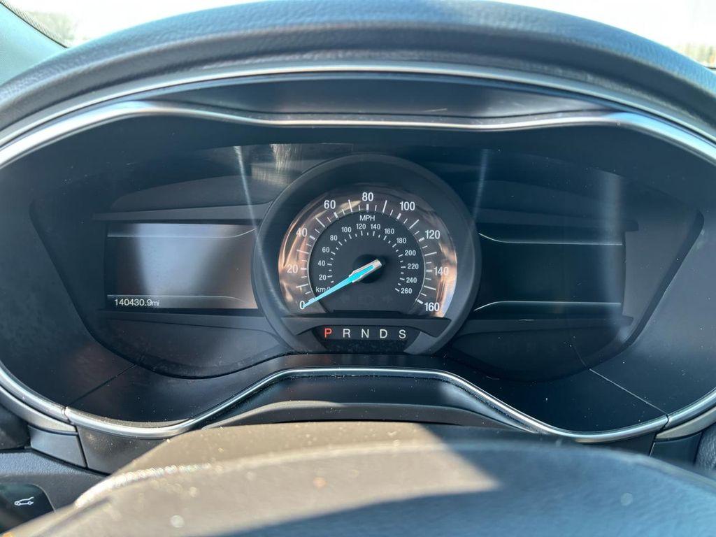 used 2016 Ford Fusion car, priced at $8,999