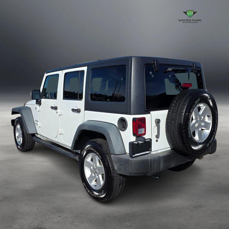 used 2015 Jeep Wrangler Unlimited car, priced at $13,988